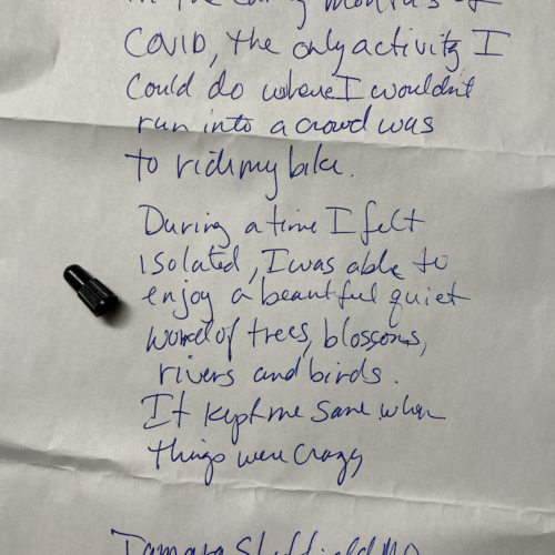 A photo of a cap for a bike tire and a description of the memento