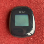 A photo of a black Fitbit